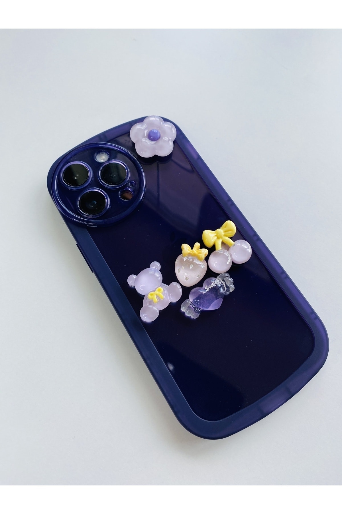 iPhone 11 Uyumlu Dönen Çiçekli Figürlü Mor Kılıf iPhone 11 Uyumlu Dönen Çiçekli Figürlü Mor Kılıf