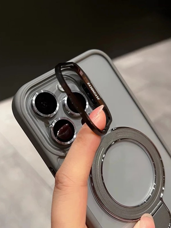 iPhone 15 Pro Max Uyumlu Gri Magsafe Ve Metal Kamera Çerçevesi Standlı Şeffaf Kılıf iPhone 15 Pro Max Uyumlu Gri Magsafe Ve Metal Kamera Çerçevesi Standlı Şeffaf Kılıf